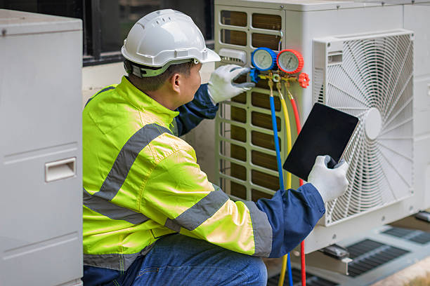 Professional Air Conditioning Repair technician working in Groveton, VA
